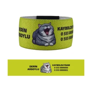 Çocuk Kimlik Bileklik Chubbypaw. Kaybolduysam yazılı ve telefon numaralı, yeşil renkli ve kedi figürlü kumaş güvenlik künyesi.